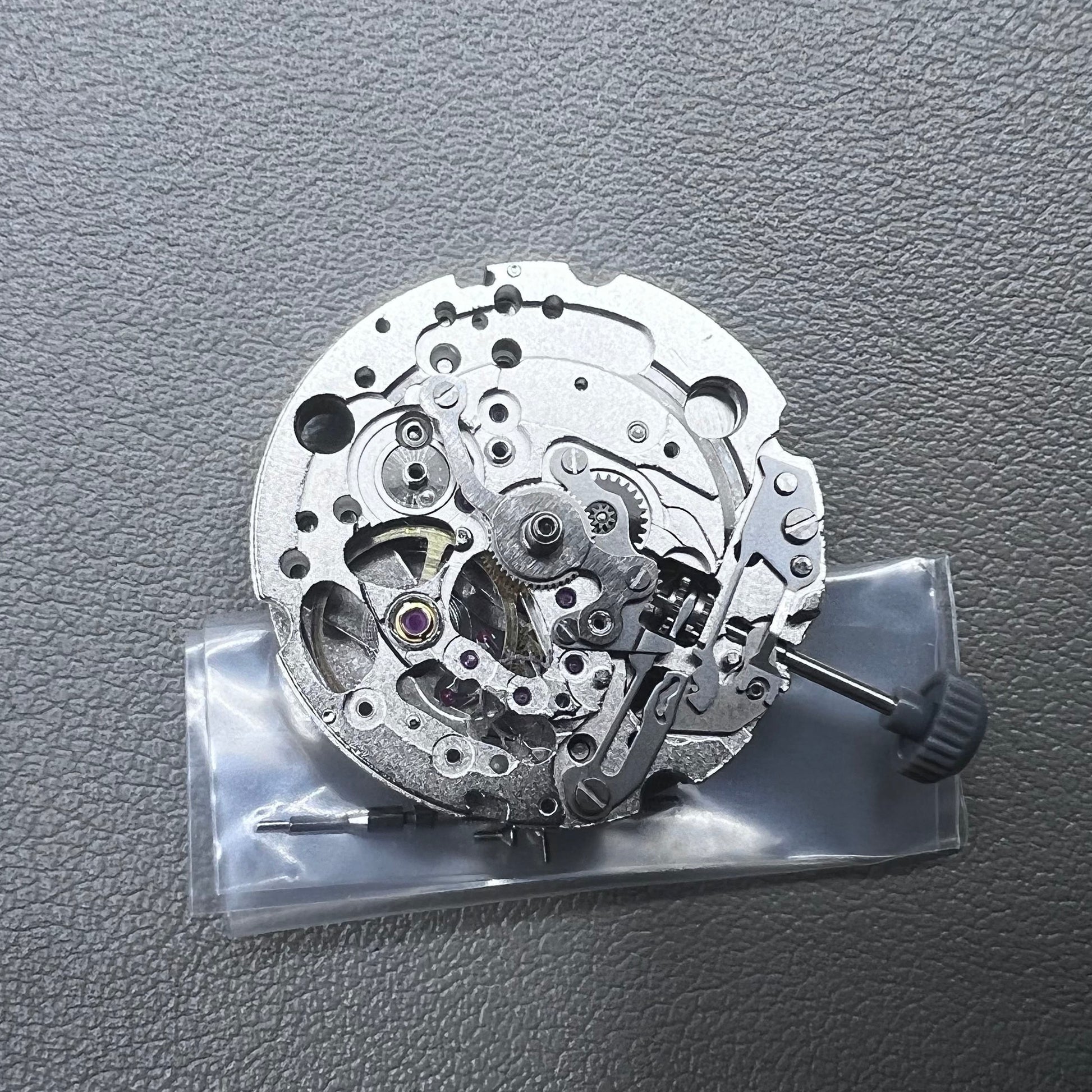 Japan Miyota 82S0 silver hollow automatic mechanical watch movement with visible gear design for precision timekeeping