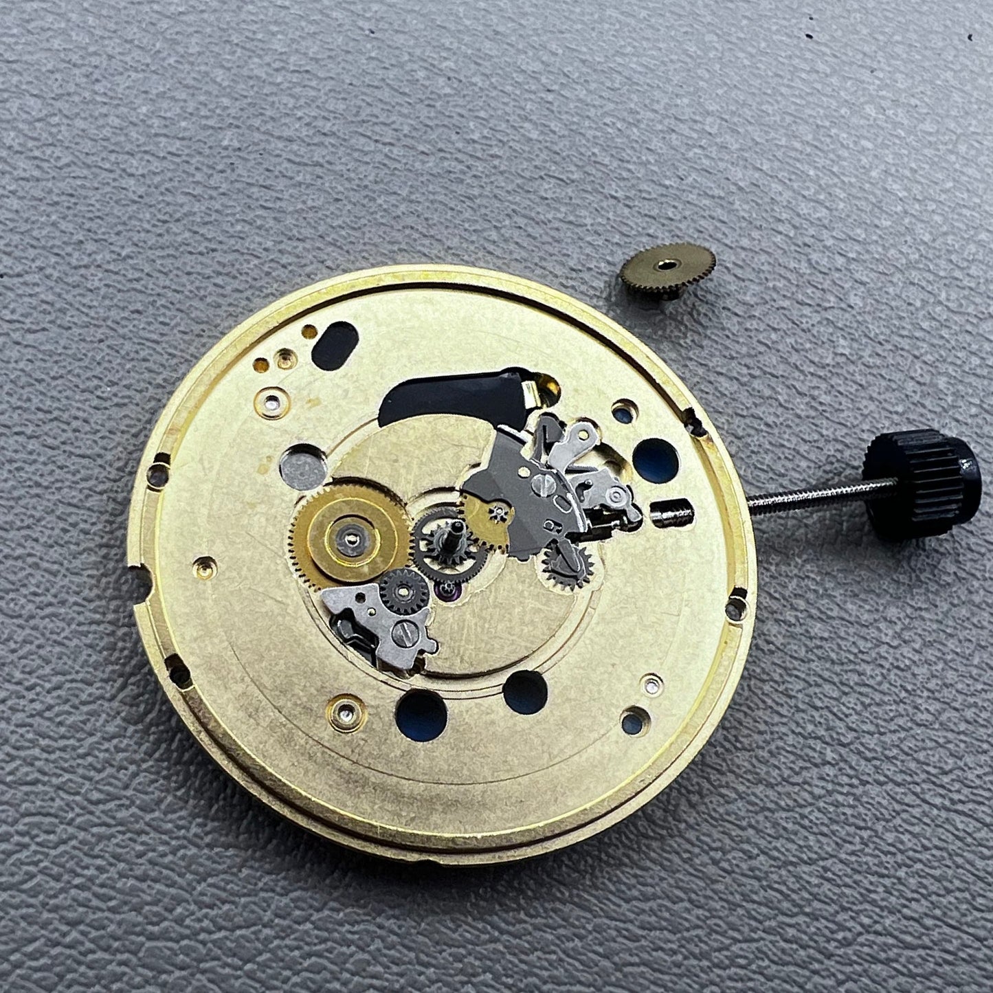 Swiss ETA 955.102 quartz watch movement by ETA, precise timekeeping without calendar function.