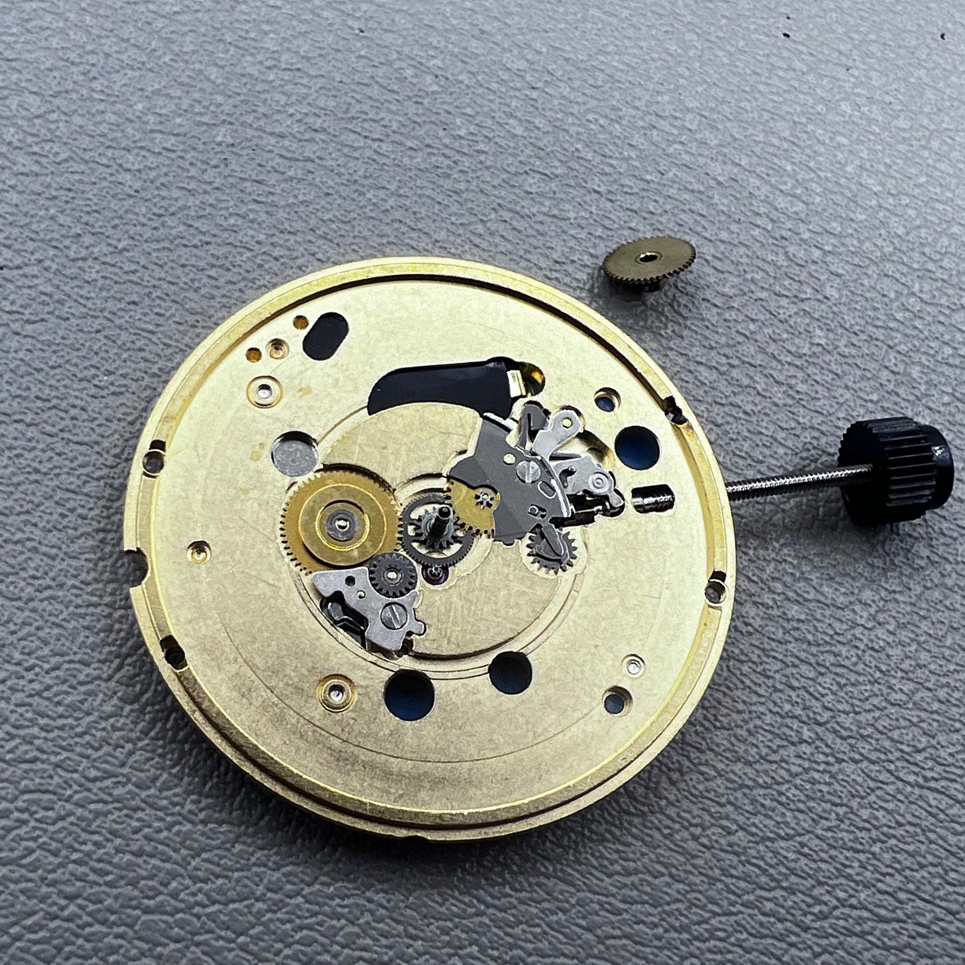 Swiss ETA 955.102 quartz watch movement by ETA, precise timekeeping without calendar function.