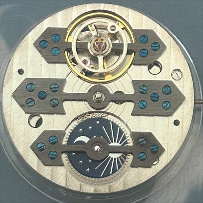 Mechanical watch repair part with moonphase feature, precise China-made movement for watch accessories.