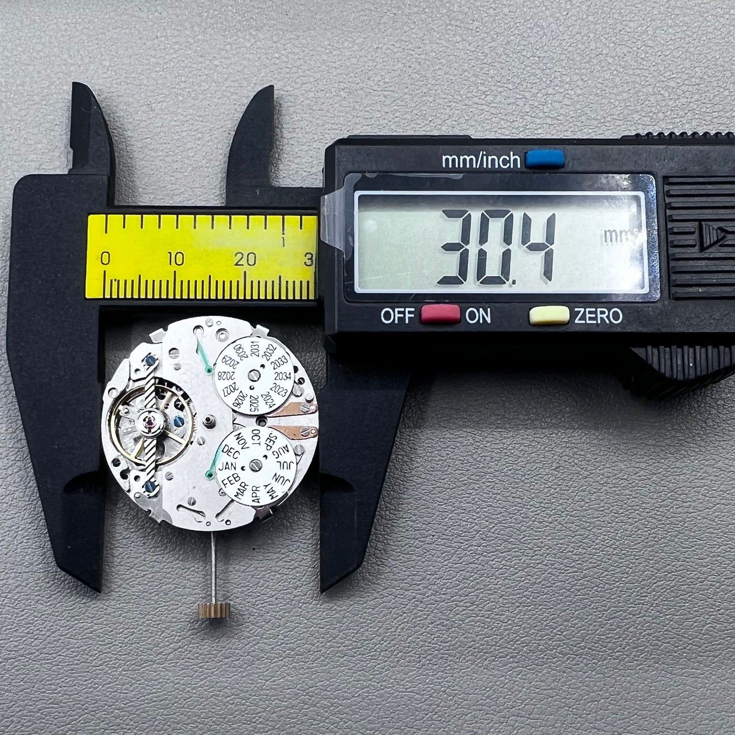 China multifunctional perpetual calendar watch accessory showcasing automatic mechanical movement details.