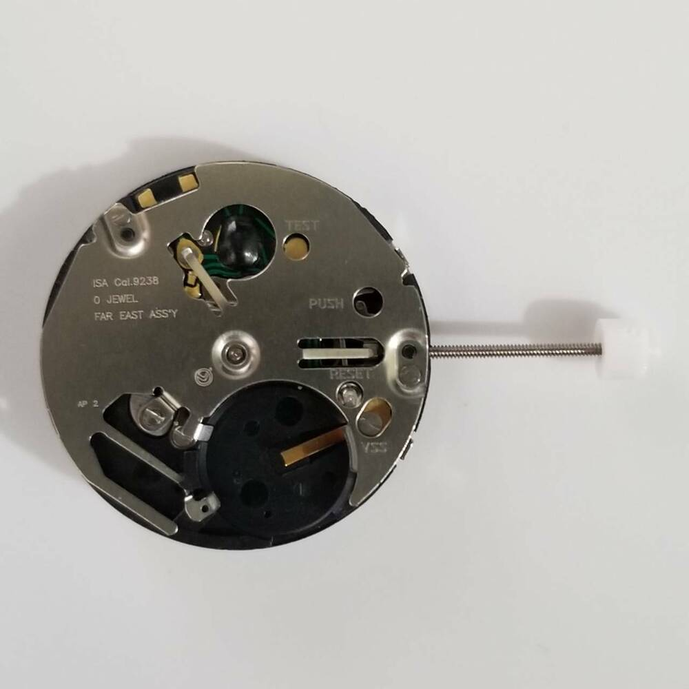 Close-up of Silver ISA 9238 quartz watch movement part, precision accessory for repairs and maintenance.