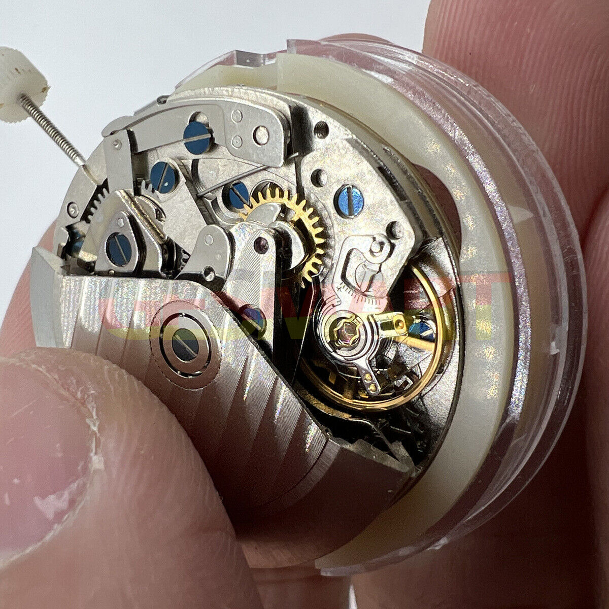 China Made 7750 GMT automatic watch movement with three hands and small second at 9, precision mechanical design.