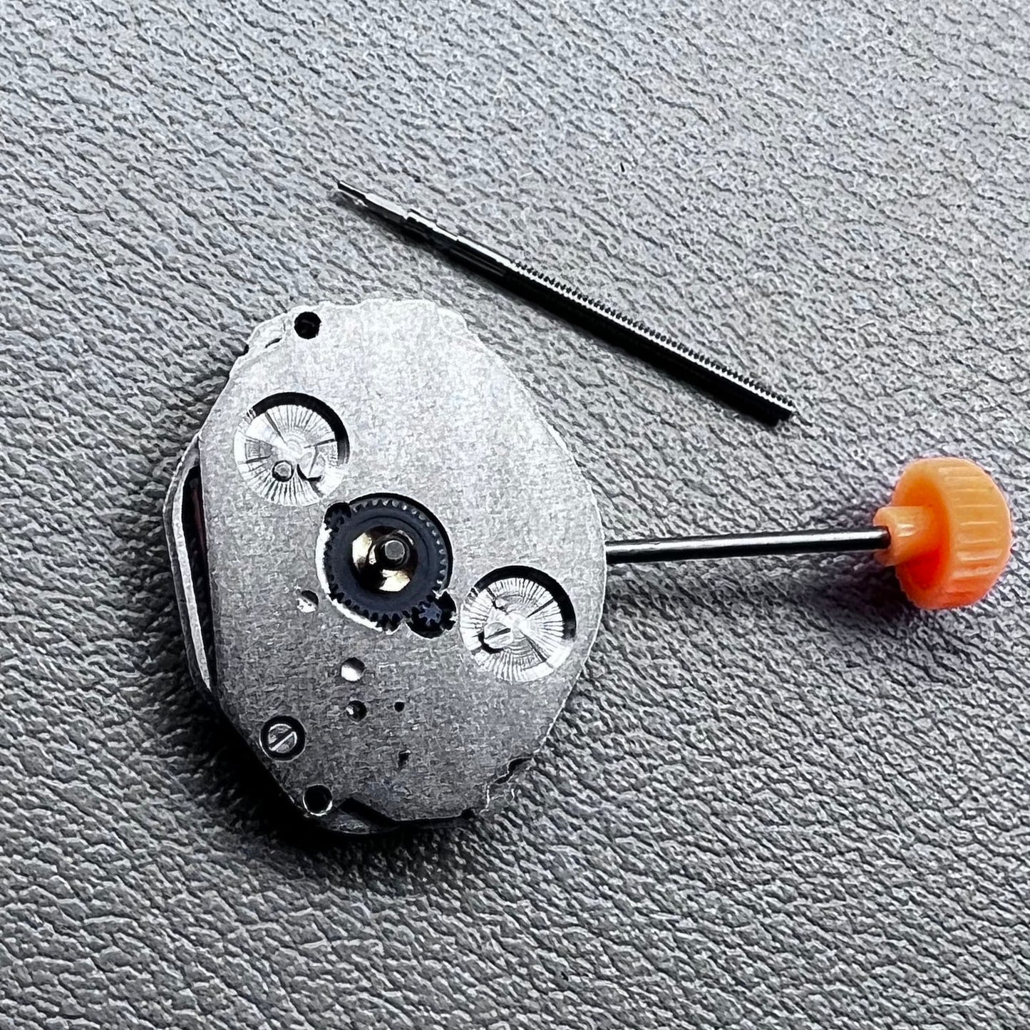 Japan Miyota 1L45 quartz movement with small second hand, precise watch accessory for repair and customization.