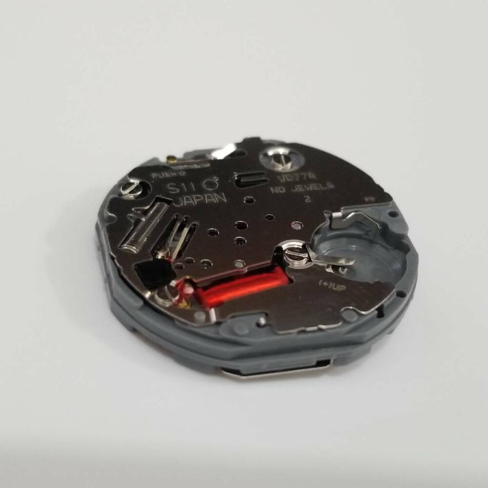 SII VD77 quartz watch movement component for precise watch repair and accurate timekeeping.