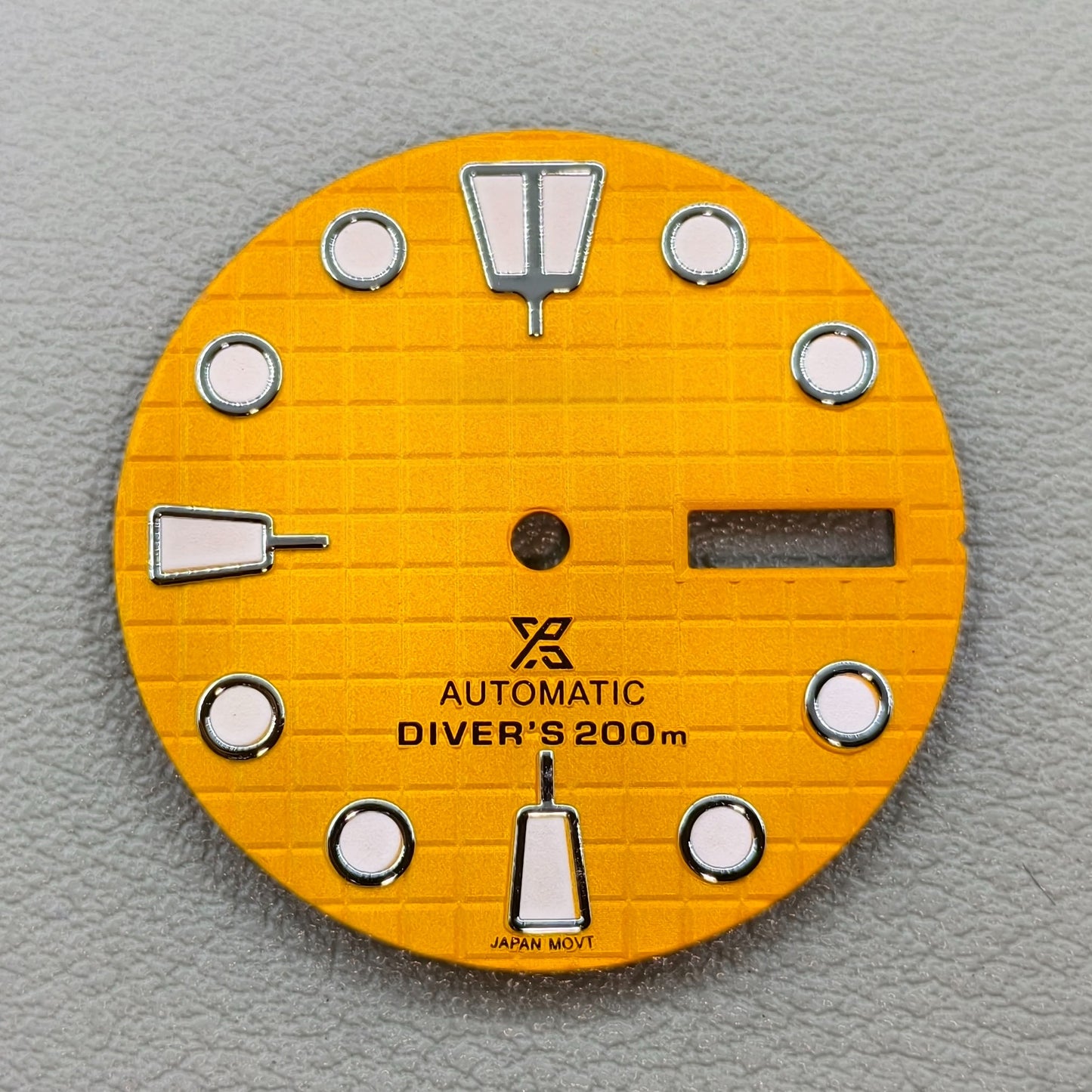 watch dial with S logo