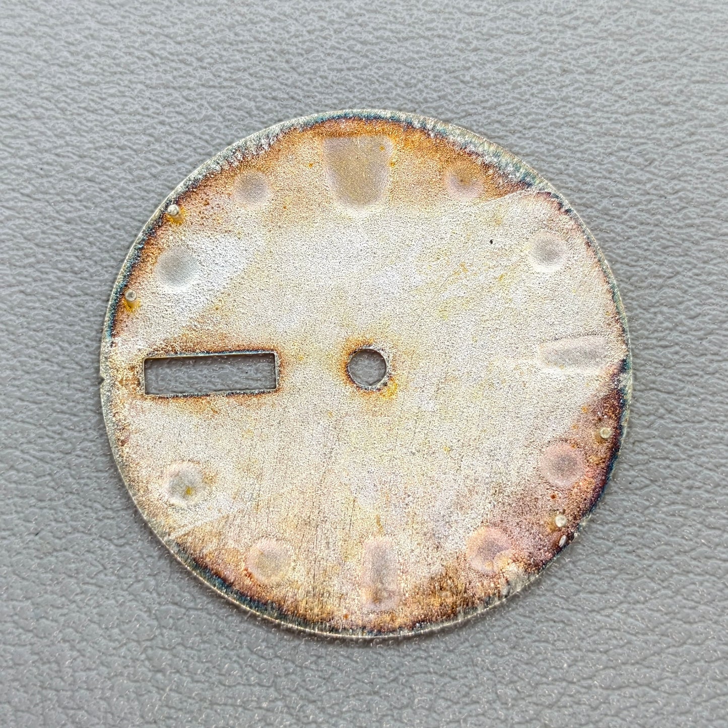 watch dial with S logo