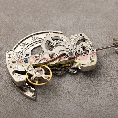 Asian Dandong silver hollow rectangle watch accessory with automatic mechanical movement detail