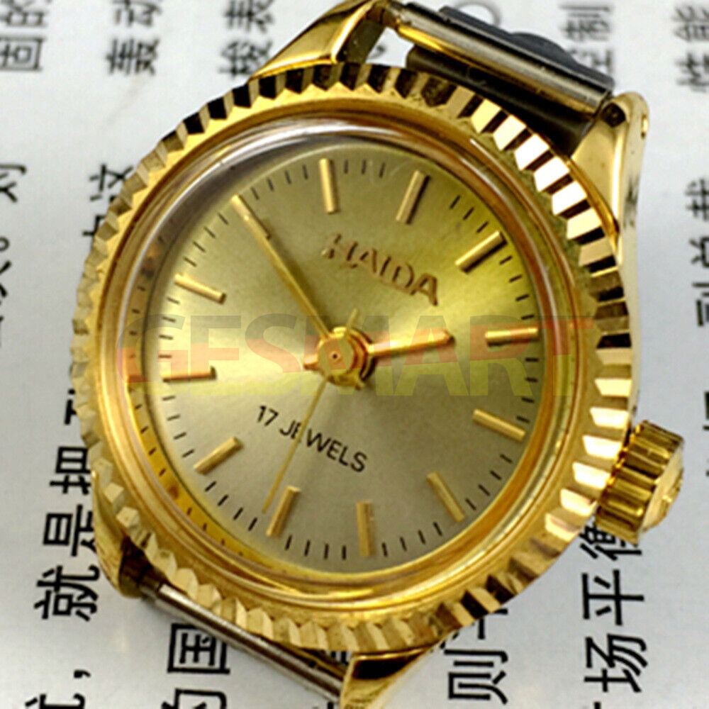 Elegant 24mm Shanghai Haida lady watch with golden nail markers, 17 jewels, and manual mechanical movement.
