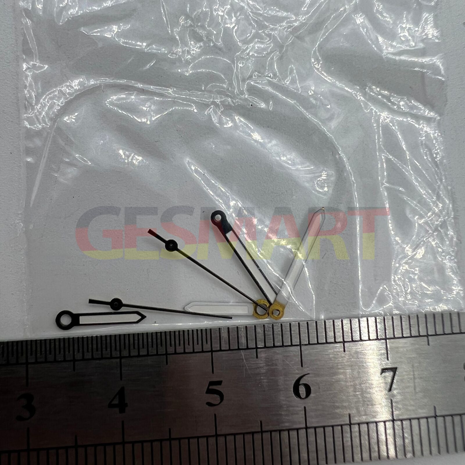 Luminous black trim watch hands by Miyota for 2035 quartz movement, improving readability and style.