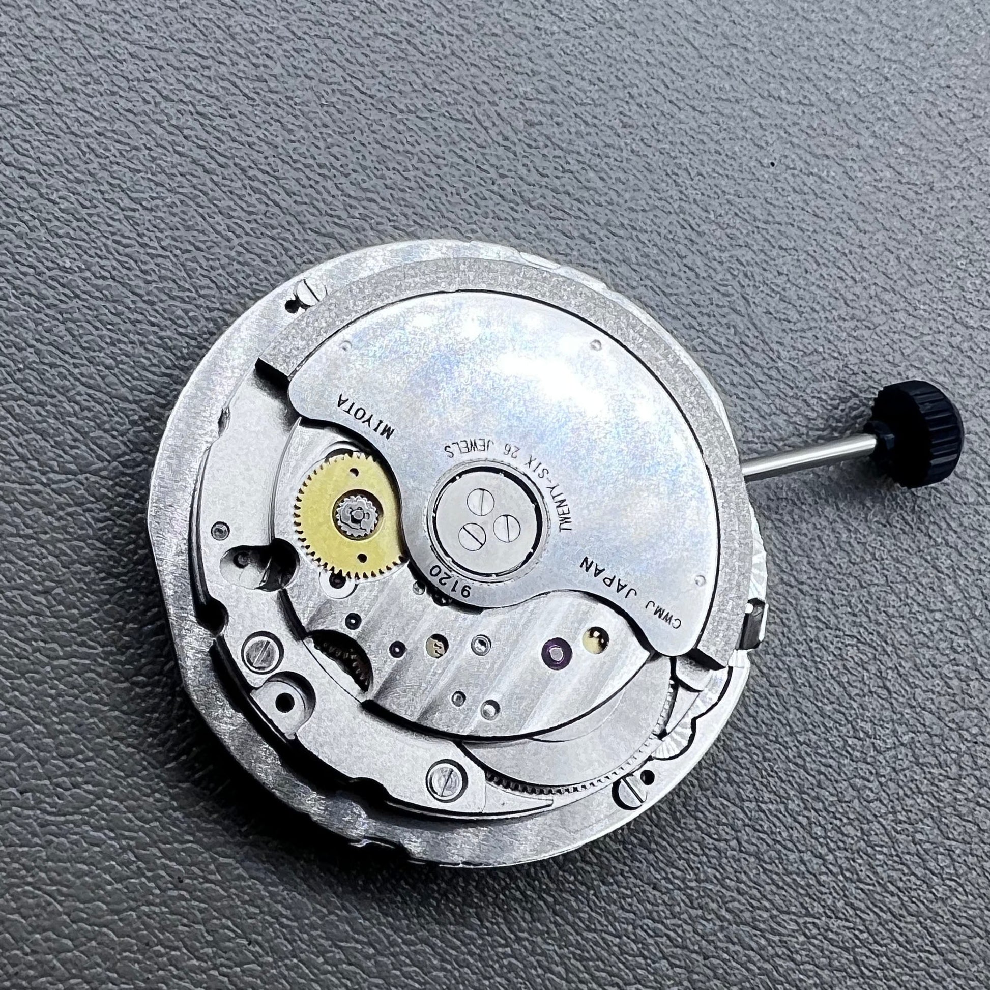 Close-up of Japan Miyota 9120 automatic mechanical watch movement showcasing precision craftsmanship.