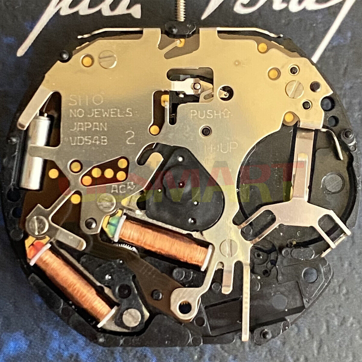 Hattori Epson TMI VD54 quartz watch movement replacement part for precise timekeeping.