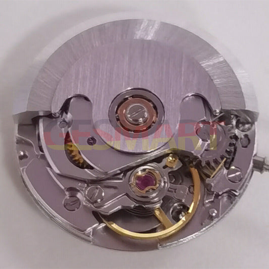 Silver mechanical watch movement with date at 3, China-made ETA2671 replacement for watch repair.