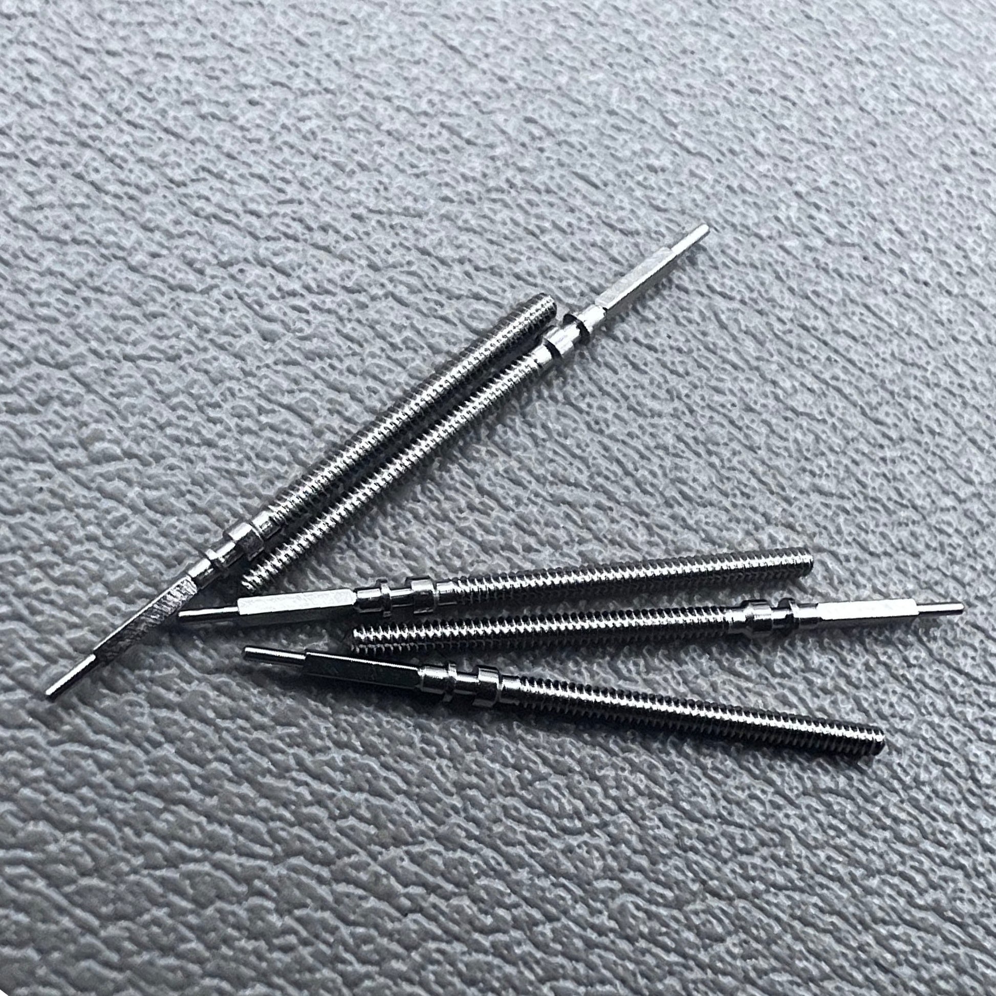 Set of 5 Omega winding stems for watch repair, compatible with 560-565 movements, precision spare parts.
