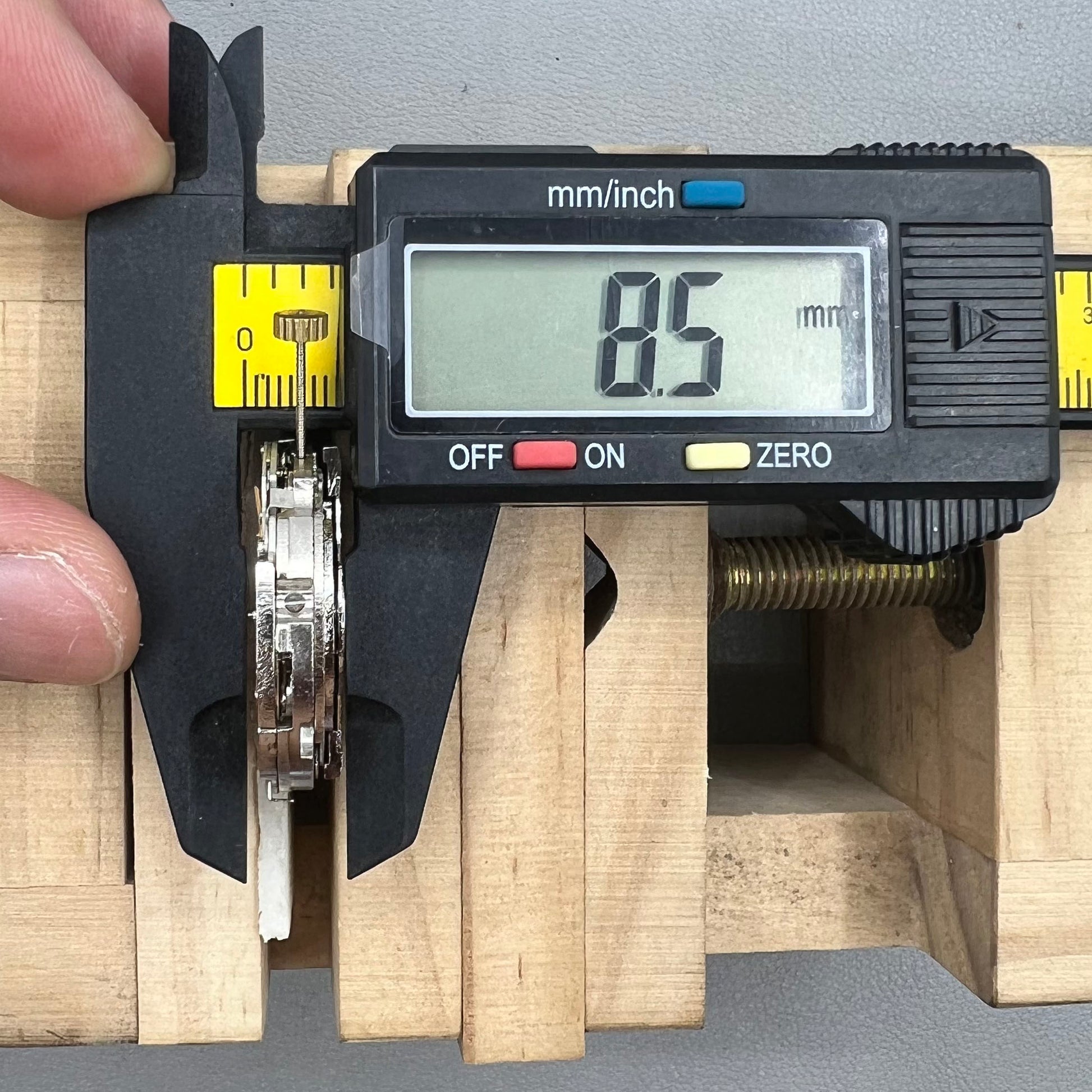 Wenzhou Mechanical watch movement with bare balance wheel and big date display at 12 o'clock.
