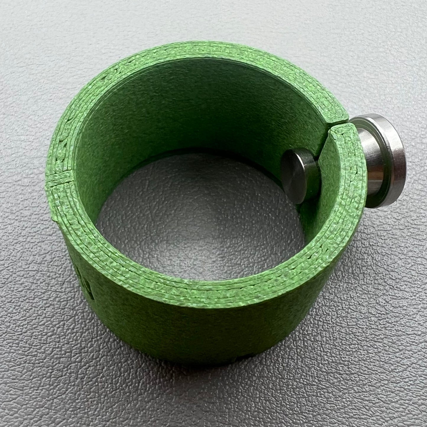 Watch movement holder securely holding Seiko NH35 movement for precise assembly and repair.