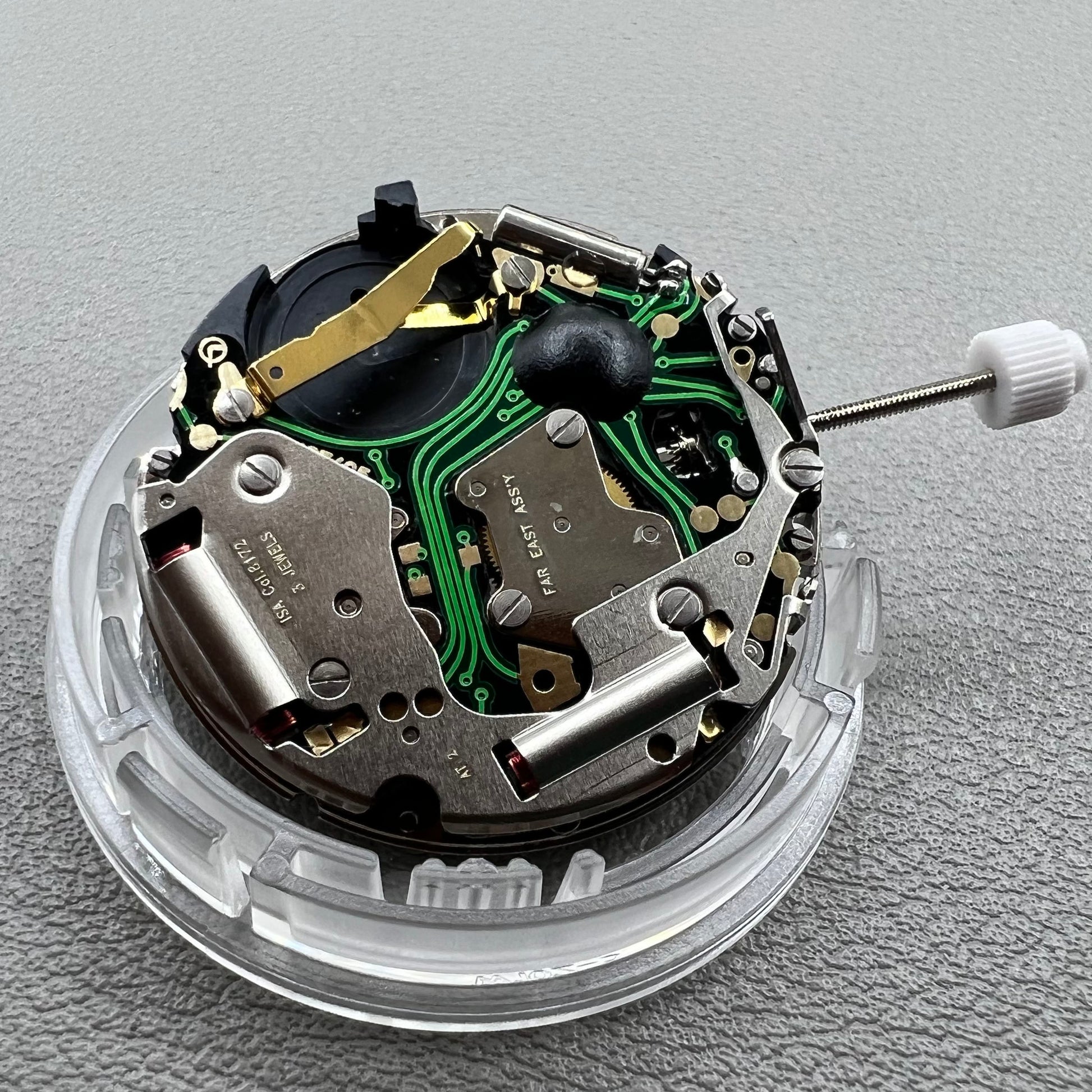 Swiss ISA 8172 Date@6 quartz watch movement replacement by ISA, precise timekeeping for watch repairs.