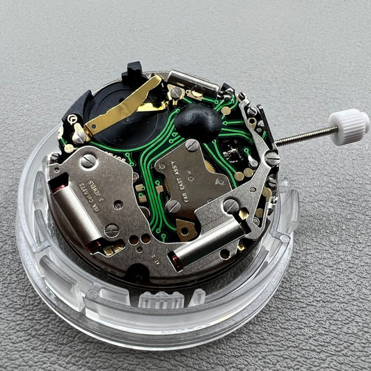 Swiss ISA 8172 Date@6 quartz watch movement replacement by ISA, precise timekeeping for watch repairs.
