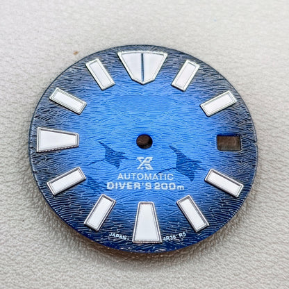 watch dial with S logo