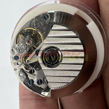 SHANGHAI 7750 black dial watch accessory featuring automatic movement, day-date display, and small second at 9 o'clock.