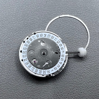Silver plated DG2813 automatic watch movement with large and small hands, date display at 3 o'clock