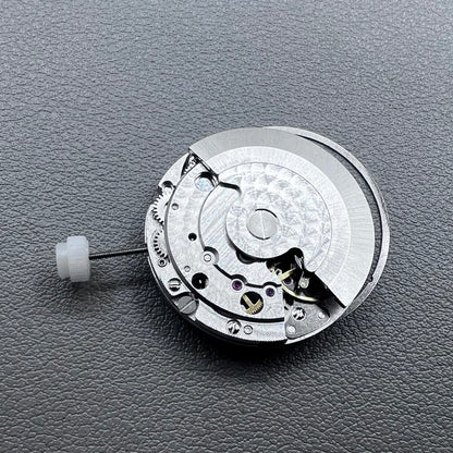 Silver plated DG2813 automatic watch movement with large and small hands, date display at 3 o'clock