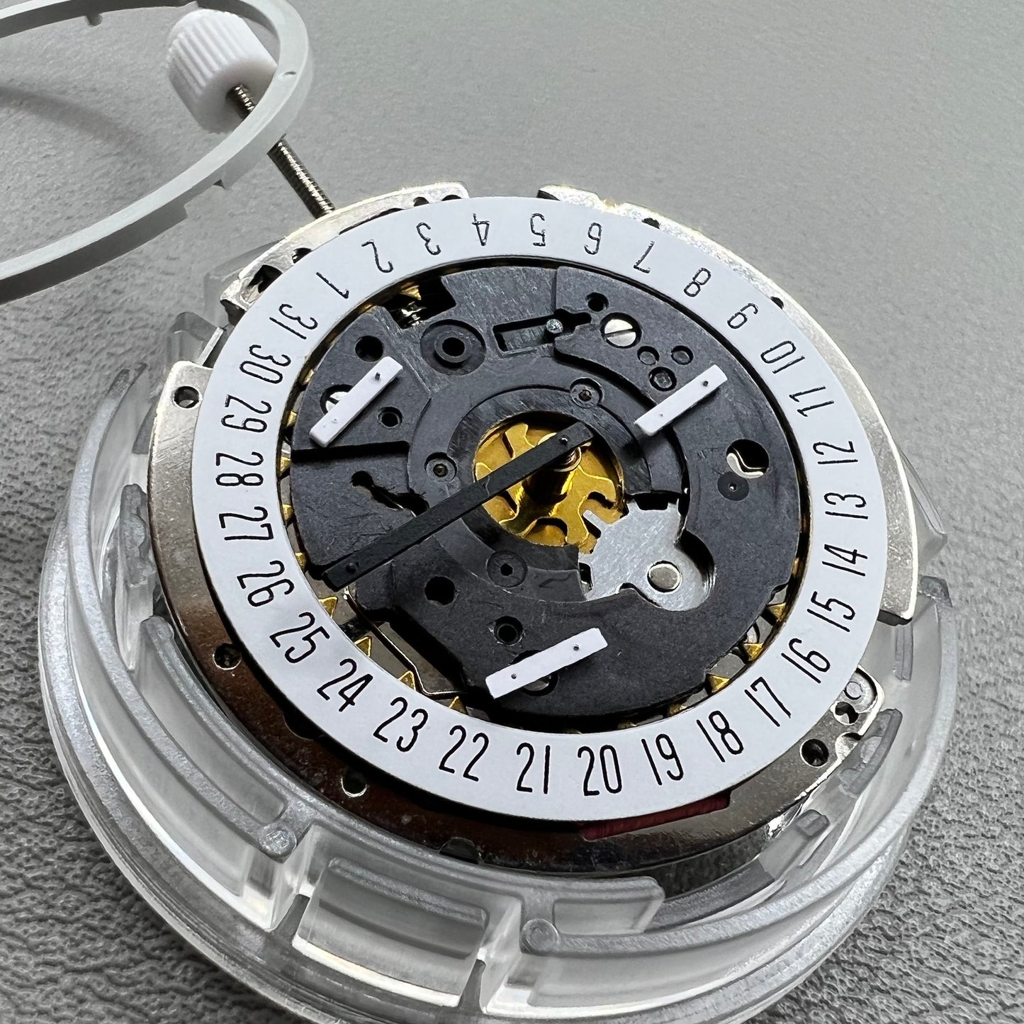 Swiss ISA 8172 Date@6 quartz watch movement replacement by ISA, precise timekeeping for watch repairs.
