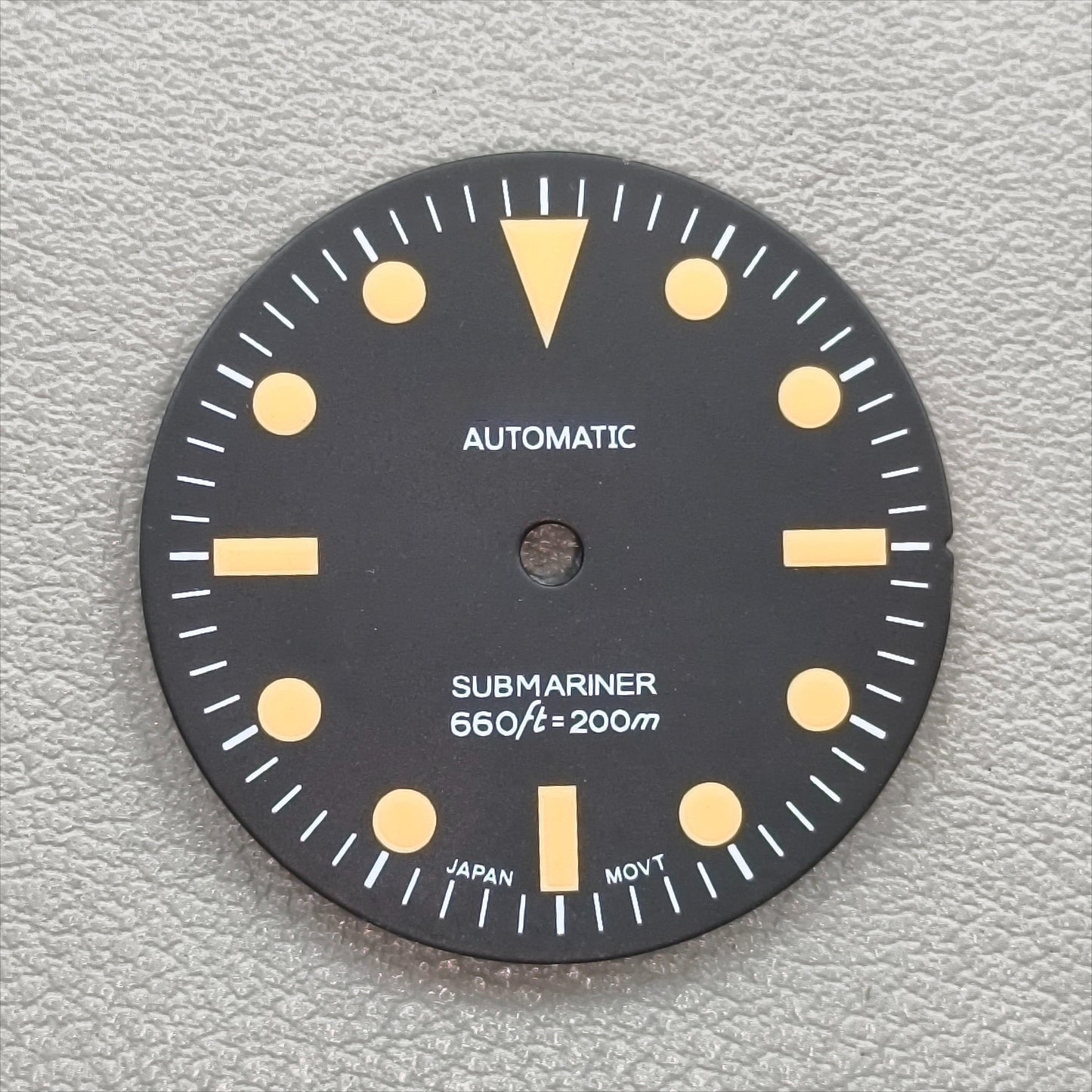 watch dial with S logo