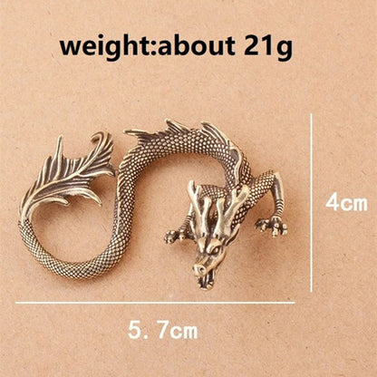 Solid copper fire-breathing dragon trinket with vintage bronze patina, hand-carved collectible figurine.