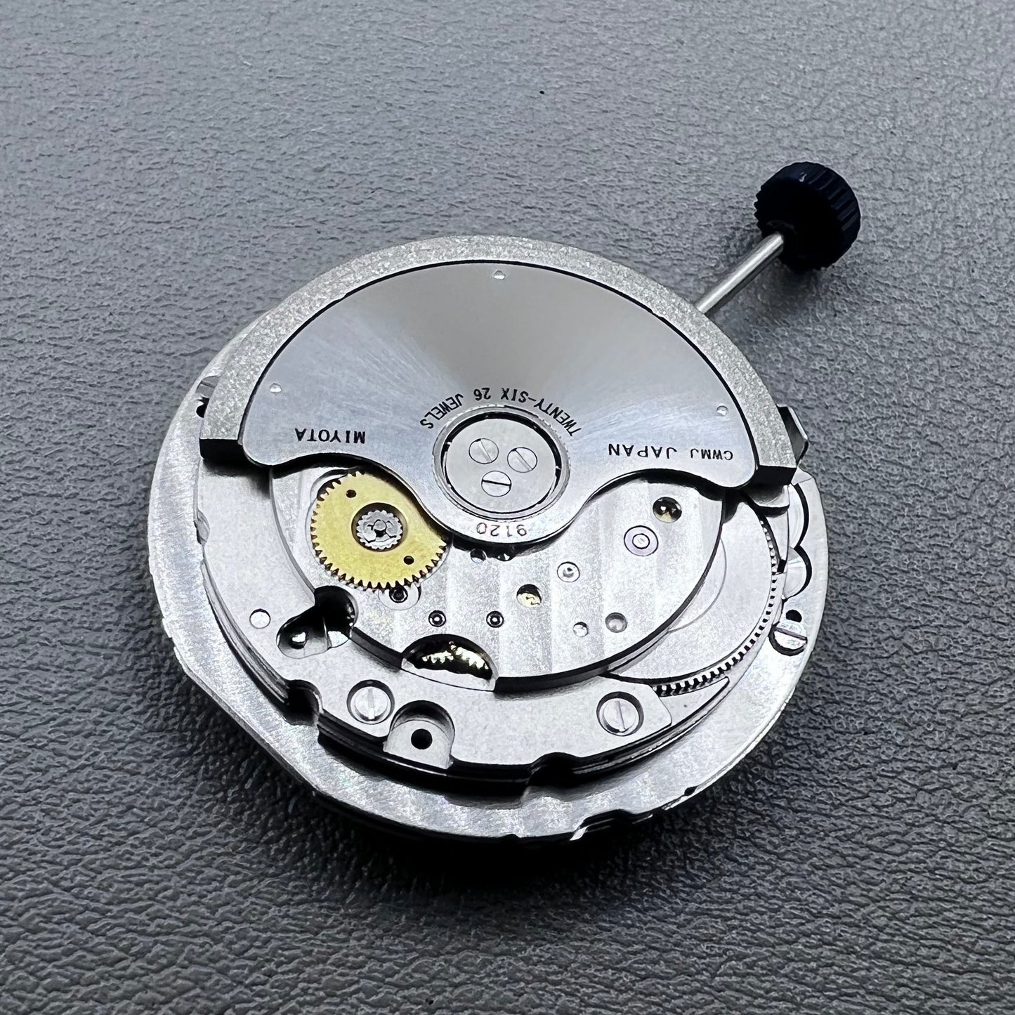 Close-up of Japan Miyota 9120 automatic mechanical watch movement showcasing precision craftsmanship.