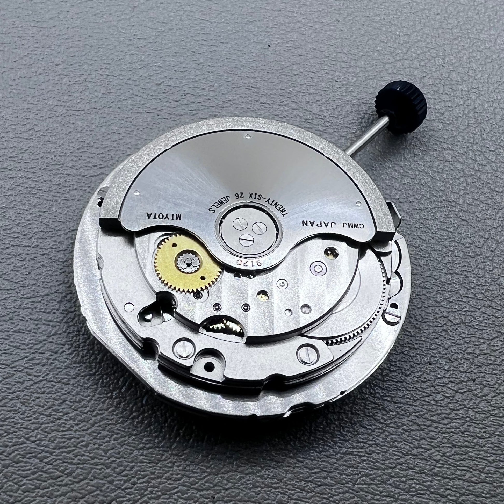 Close-up of Japan Miyota 9120 automatic mechanical watch movement showcasing precision craftsmanship.