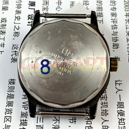 Shanghai Factory 34mm manual mechanical watch with black dial, 19 jewels, shock-resistant design.