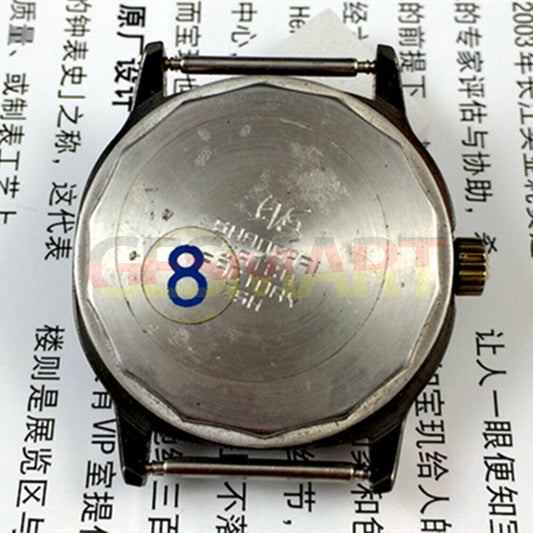 Shanghai Factory 34mm manual mechanical watch with black dial, 19 jewels, shock-resistant design.