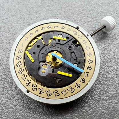 Swiss ISA 8162 golden watch disk with date feature, quartz movement replacement by ISA, ideal for watch repair.