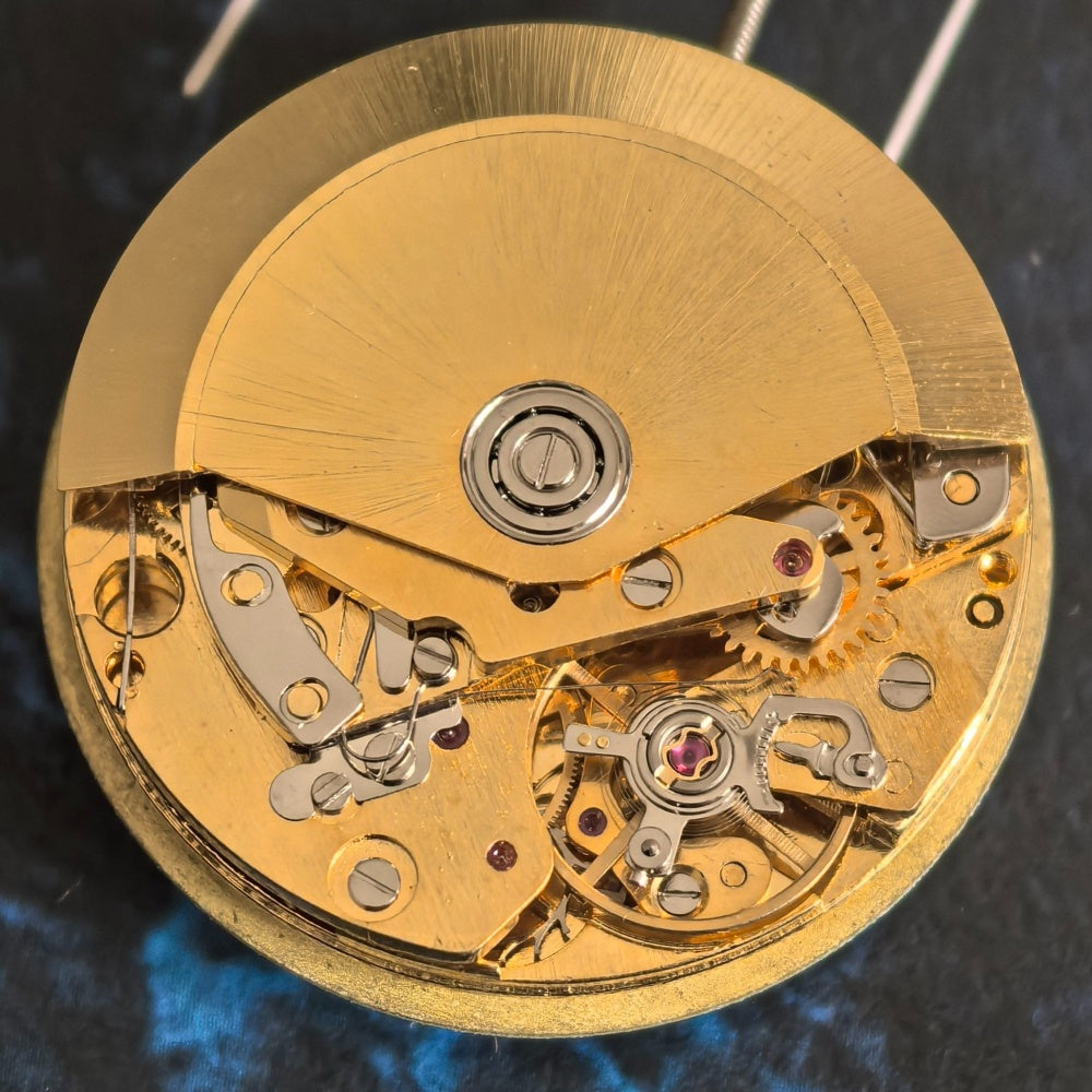 Chinese Dandong 7750 mechanical watch movement, 21600Hz frequency, small seconds at 9 o'clock detail.