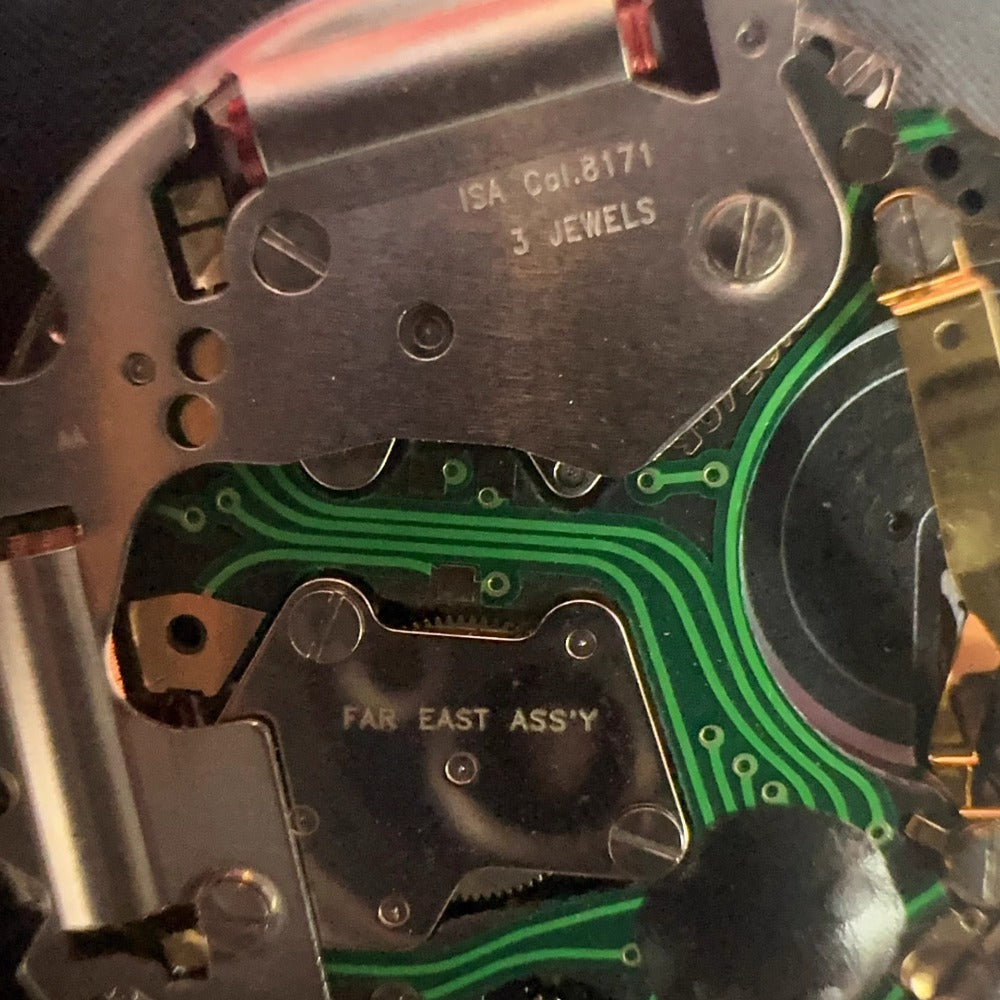 Swiss Made ISA8171 watch accessory featuring quartz movement, multifunctional 5 hands, and black font date at 6 o'clock.