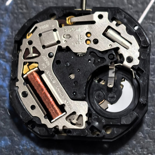 Hattori VP44 quartz watch movement with 3 hands and date window at 6 o'clock for replacements
