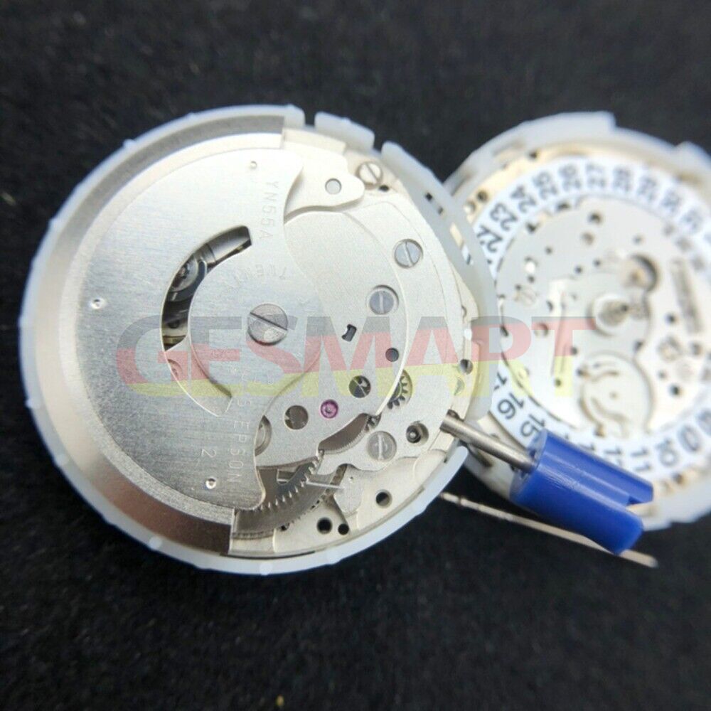 Epson YN55 mechanical watch movement with single calendar, precision-crafted Japanese mechanism.