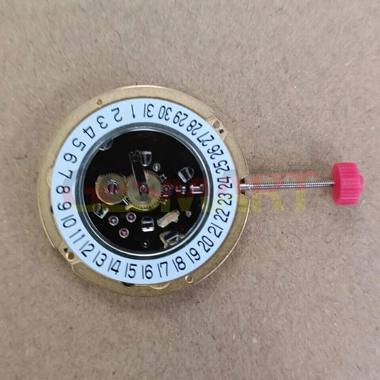 Ronda 1009 Swiss quartz watch movement with date display at 6 o'clock, precision timekeeping accessory.