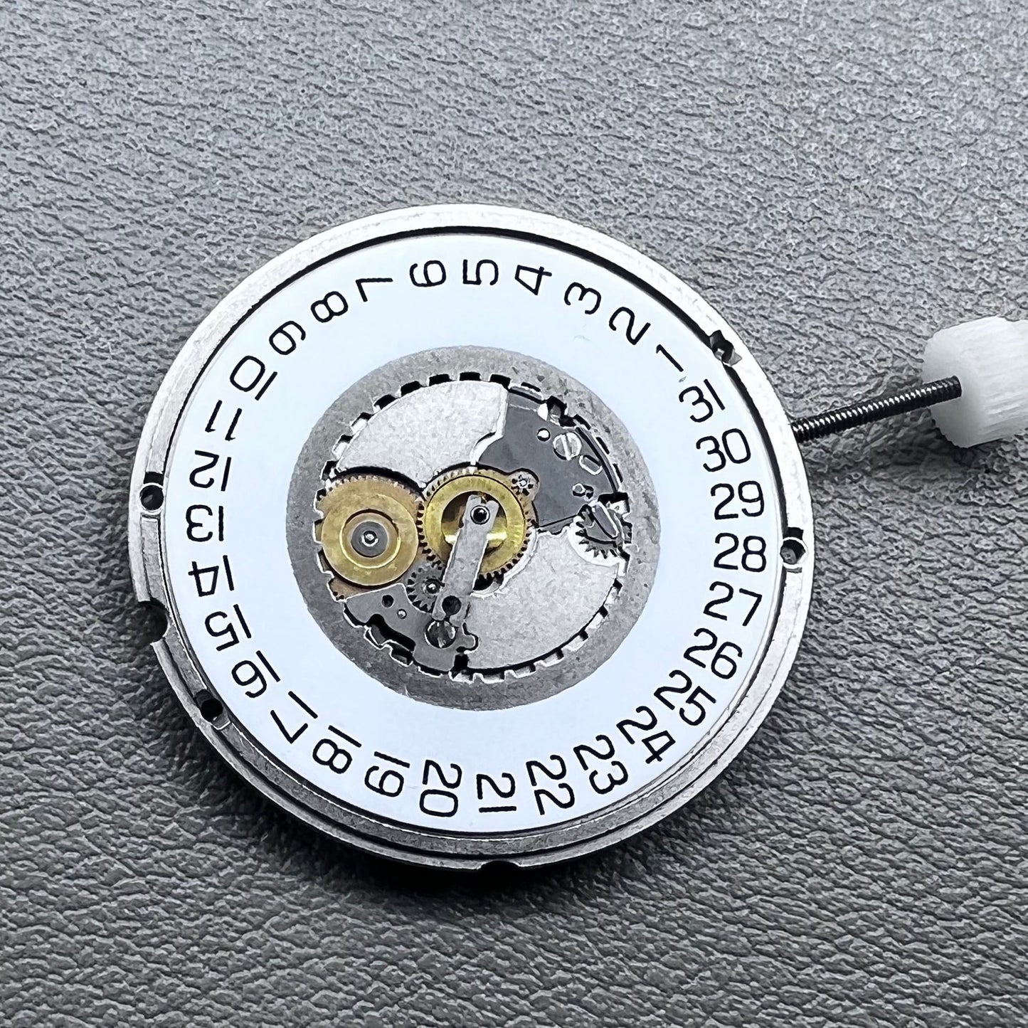 Swiss ETA 955.114 quartz movement with 3 hands for precise watch accessory replacement.