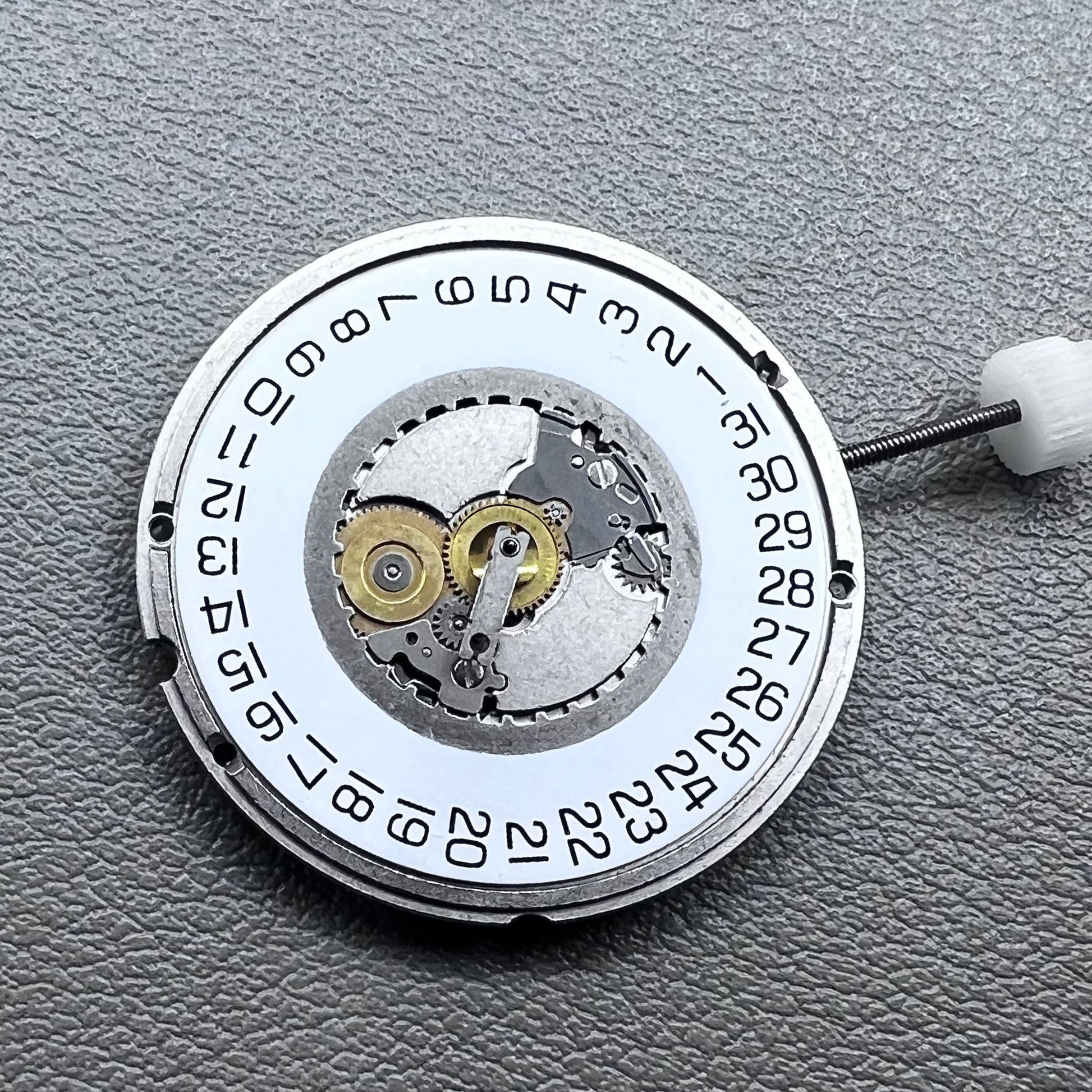 Swiss ETA 955.114 quartz movement with 3 hands for precise watch accessory replacement.