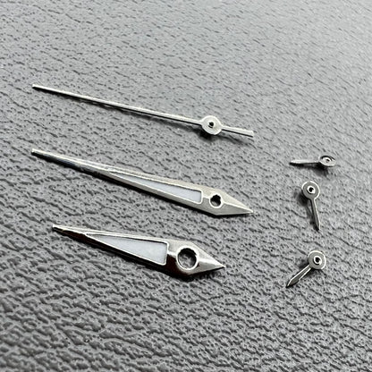 Set of 2 silver-trimmed green lume arrow-shaped watch hands for VX3J, VX9J, VX7J, VX3N, VX9N movements.