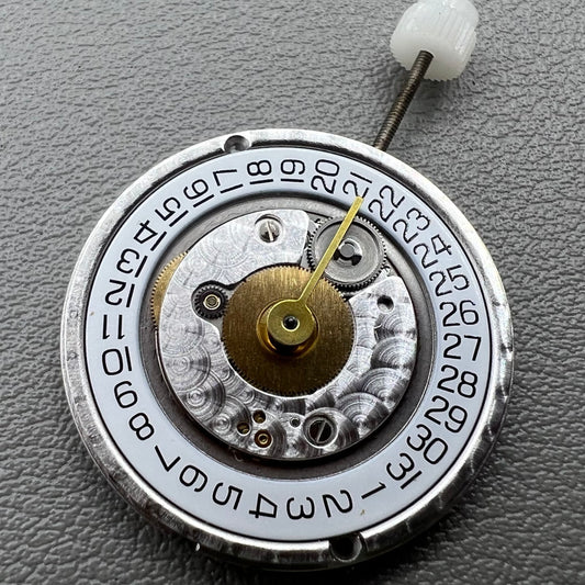 Swiss ETA255.112 quartz movement watch part with single calendar, precision timekeeping by ETA.