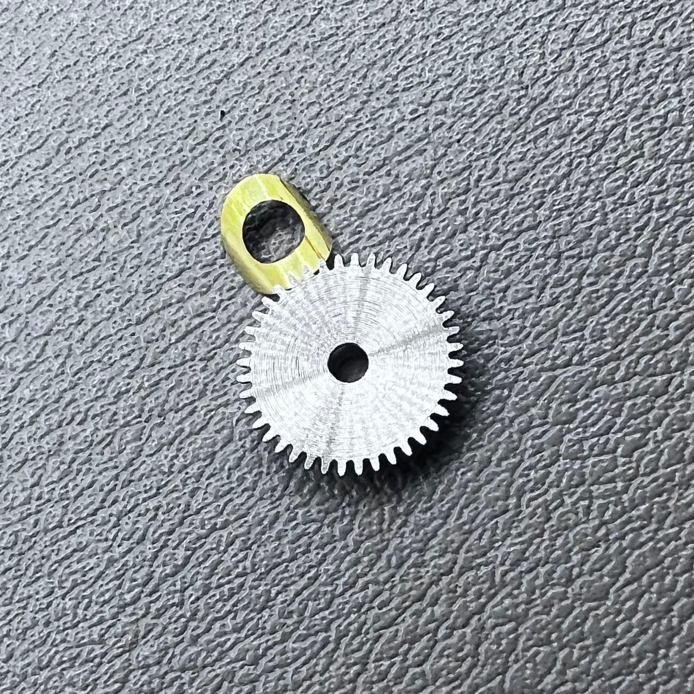 Set of 3 train bridge and hour wheel components for Seagull ST3600 and ETA6497 watch movements.