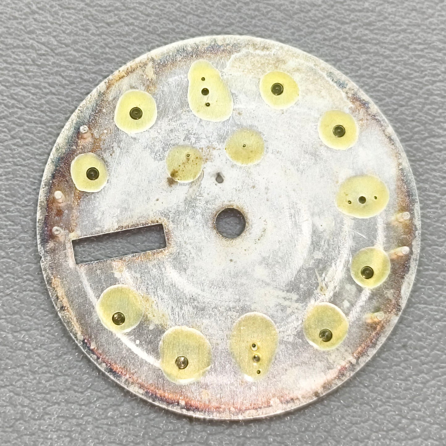 watch dial with S logo