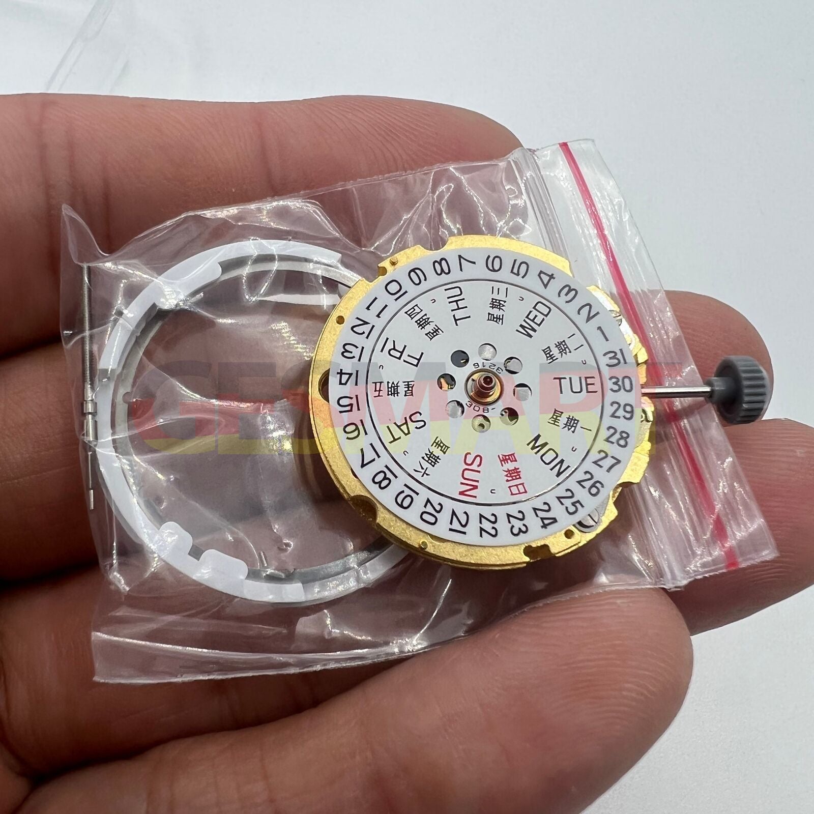 Golden Miyota Citizen 8200 series automatic mechanical movement displaying day and date functions.