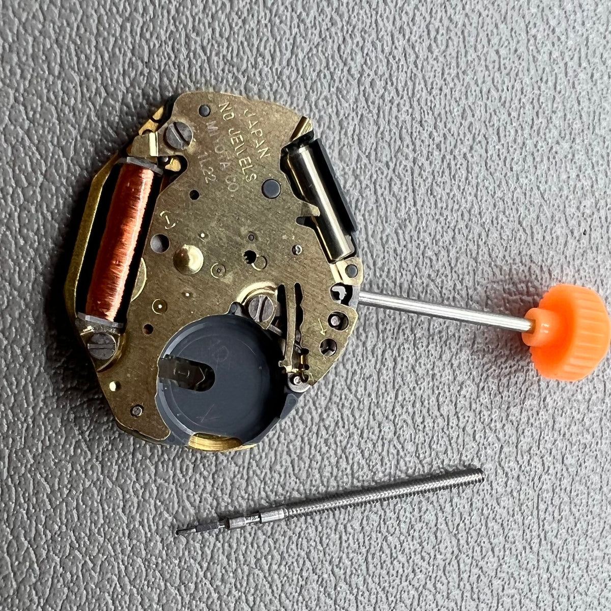 Miyota 1L22 quartz movement from Japan, reliable watch accessory for precise timekeeping.