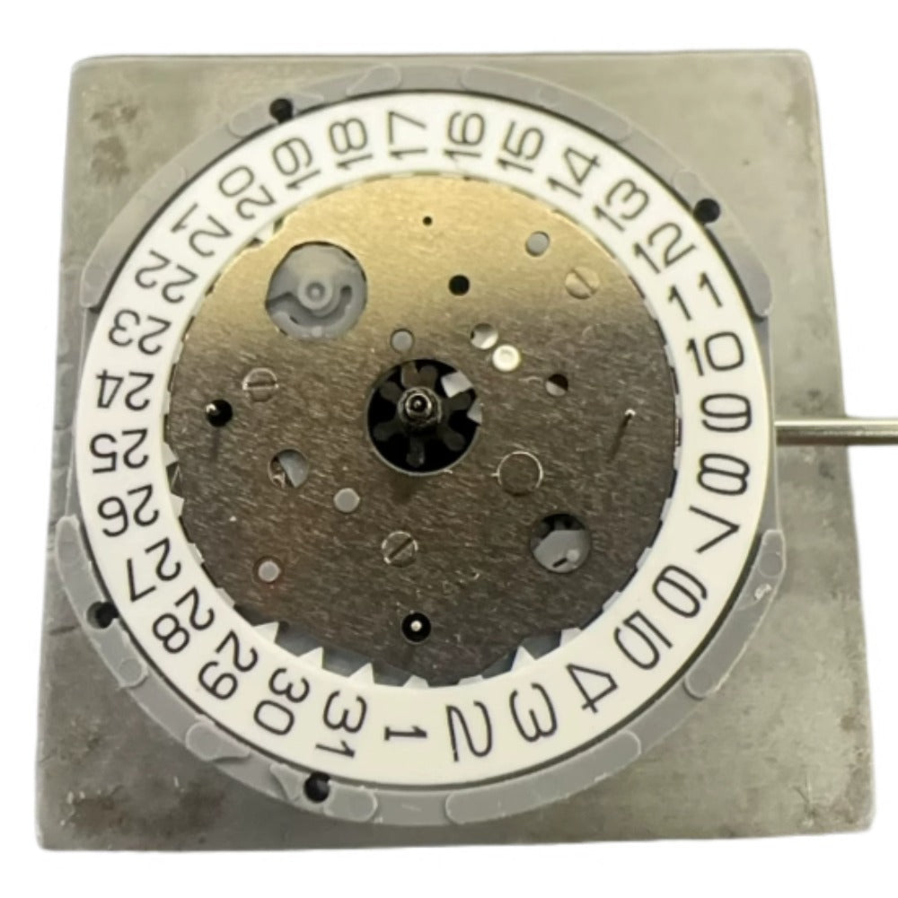 Miyota FS23 quartz watch movement with date display at 3 o'clock, Japan made, precise timekeeping by Miyota.