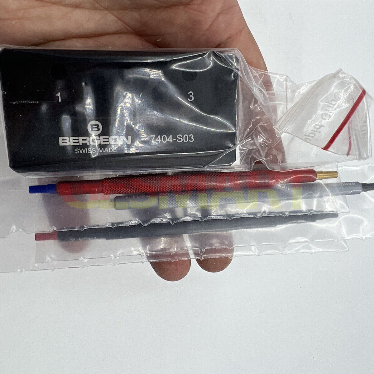 Bergeon 7404-S03 watch hand fitting tools set of 3 with sturdy base for precise watch repair and assembly.