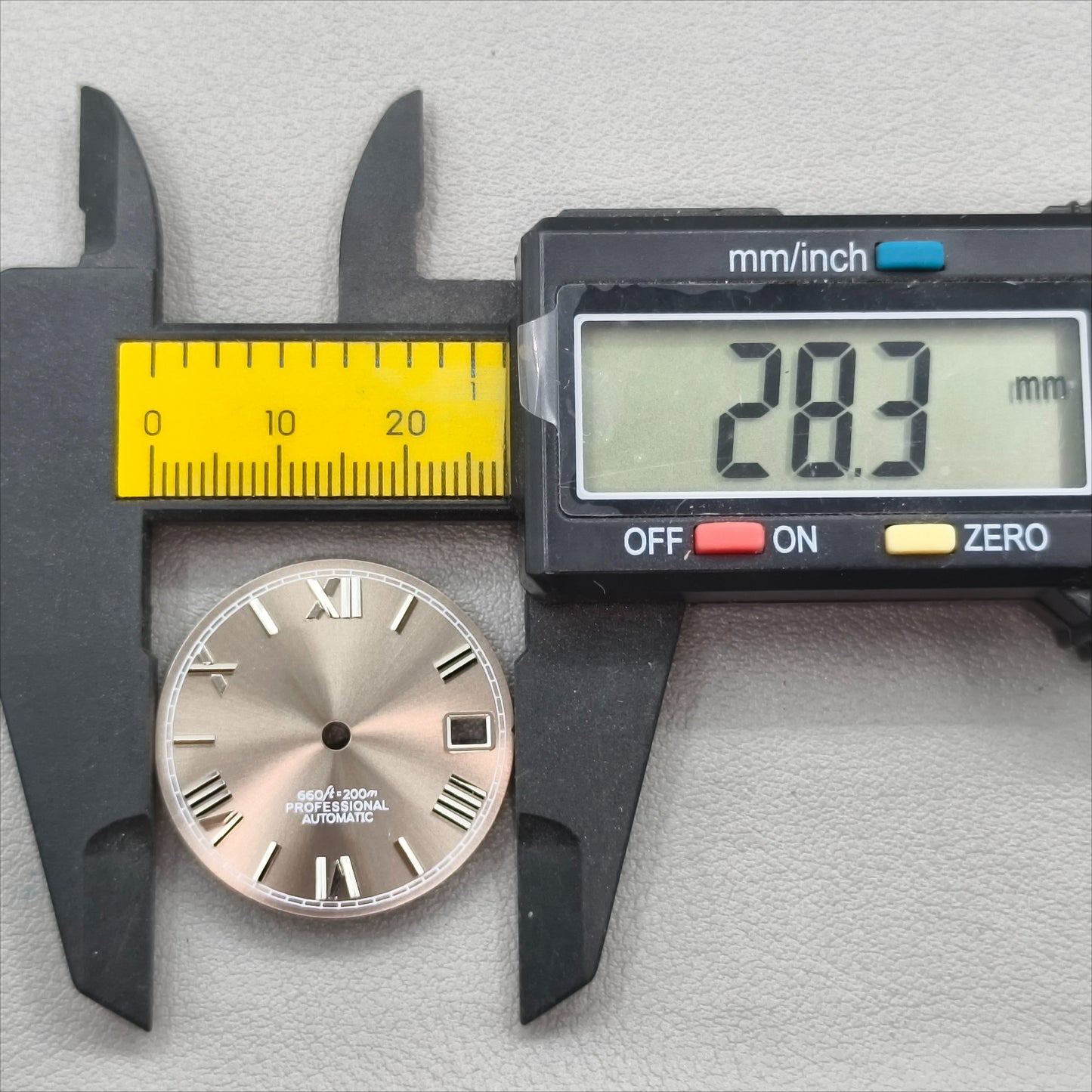 watch dial with S logo